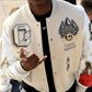 Close-up of the chest patches and button fastening on the AC Milan-inspired varsity jacket