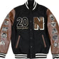 Front of Negro League Baseball S9 varsity jacket with black body, brown sleeves and embroidered patches