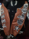 Front and sleeve embroidery details on the Negro League Baseball S9 varsity jacket